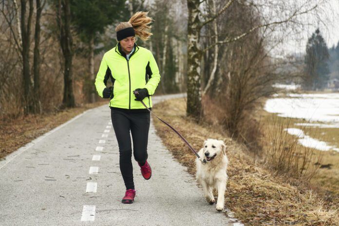 Running with dog in winter Running with your dog is great, but you should be mindful of your dog's health.